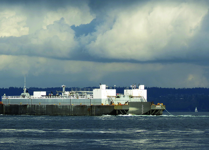 A fuel barge in Puget Sound on a cloudy day.